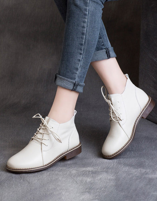 Botas planas retro con cordones y punta puntiaguda