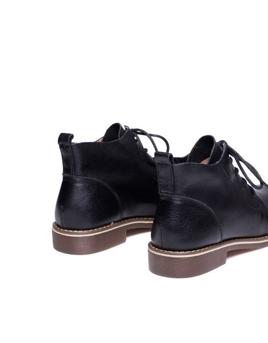 Botas planas retro con cordones y punta puntiaguda