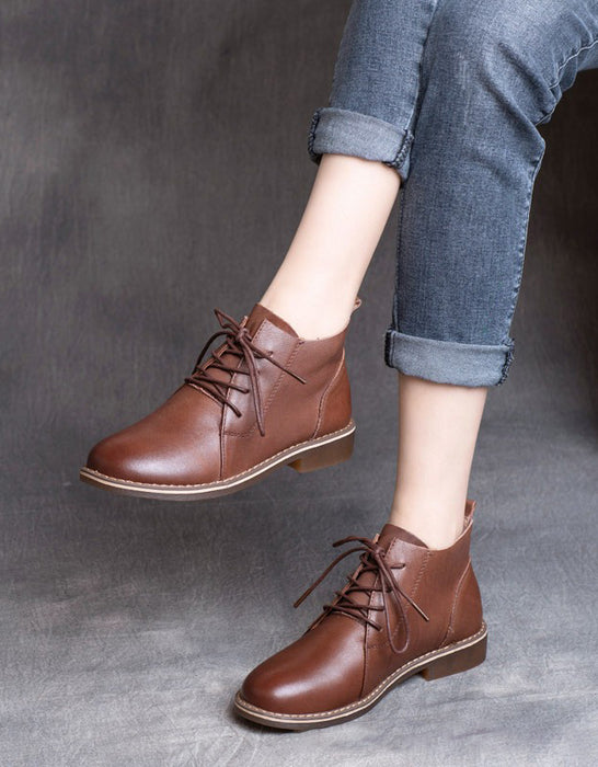 Botas planas retro con cordones y punta puntiaguda