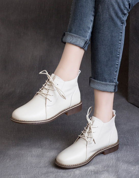 Botas planas retro con cordones y punta puntiaguda