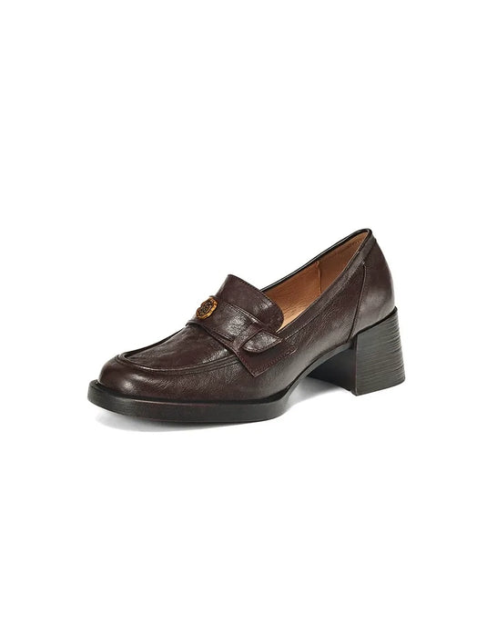 Brown leather loafer shoe on a white background