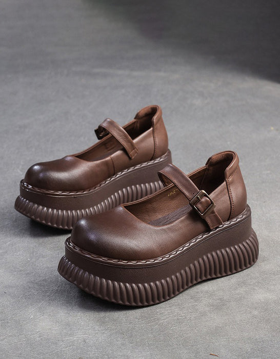 Sandales compensées en cuir creux à bride arrière