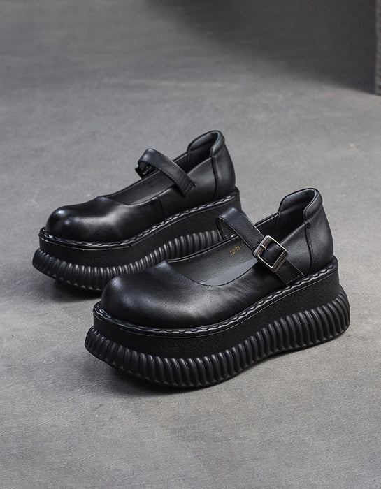 Sandales compensées en cuir creux à bride arrière