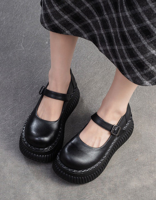 Sandales compensées en cuir creux à bride arrière