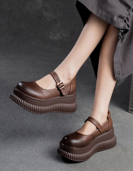 Sandales compensées en cuir creux à bride arrière