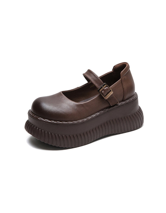 Sandales compensées en cuir creux à bride arrière